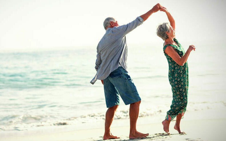 Couple dancing on the beach