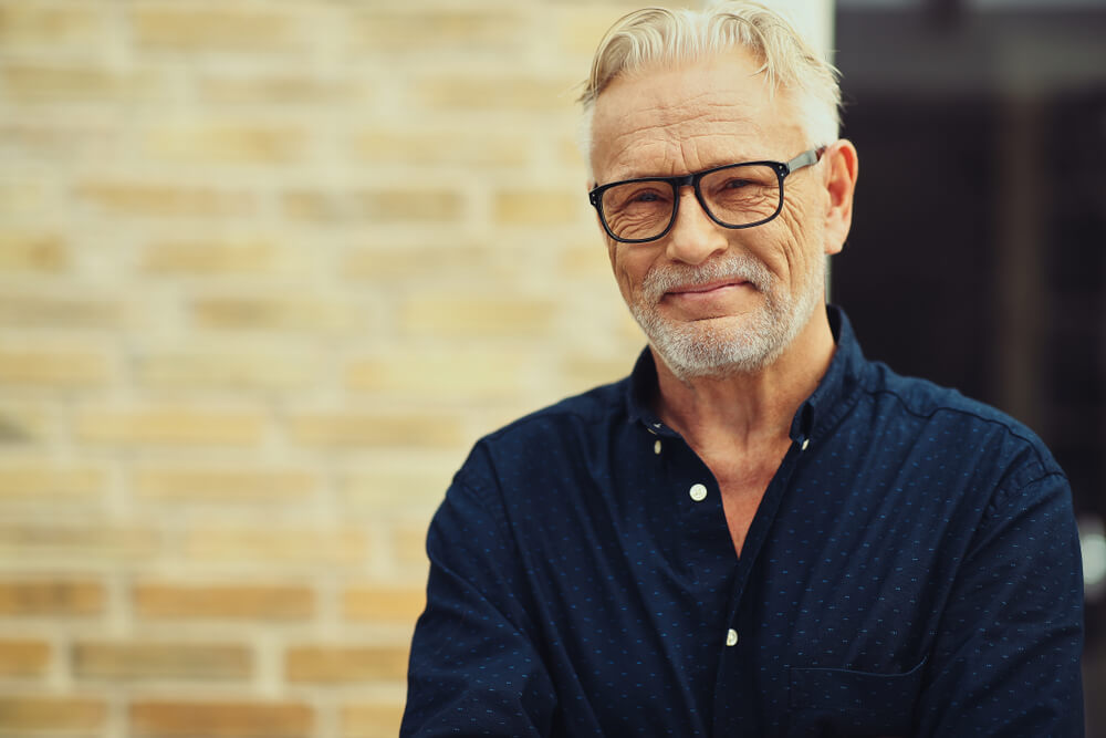 mature man wearing glasses